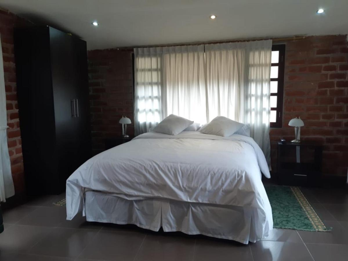 El Pedron Hotel Banos  Bagian luar foto